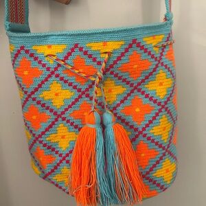 Vibrant Woven Bucket Bag with Tassels